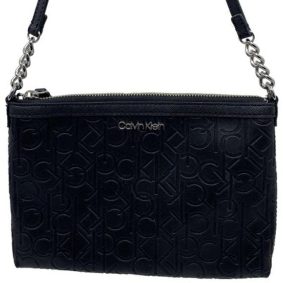Calvin Klein Handbags - Calvin Klein Black Leather Wristlet